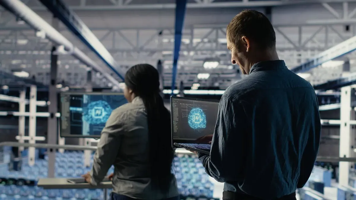 AI pilot to production implementation with software developers monitoring AI systems and operational metrics.