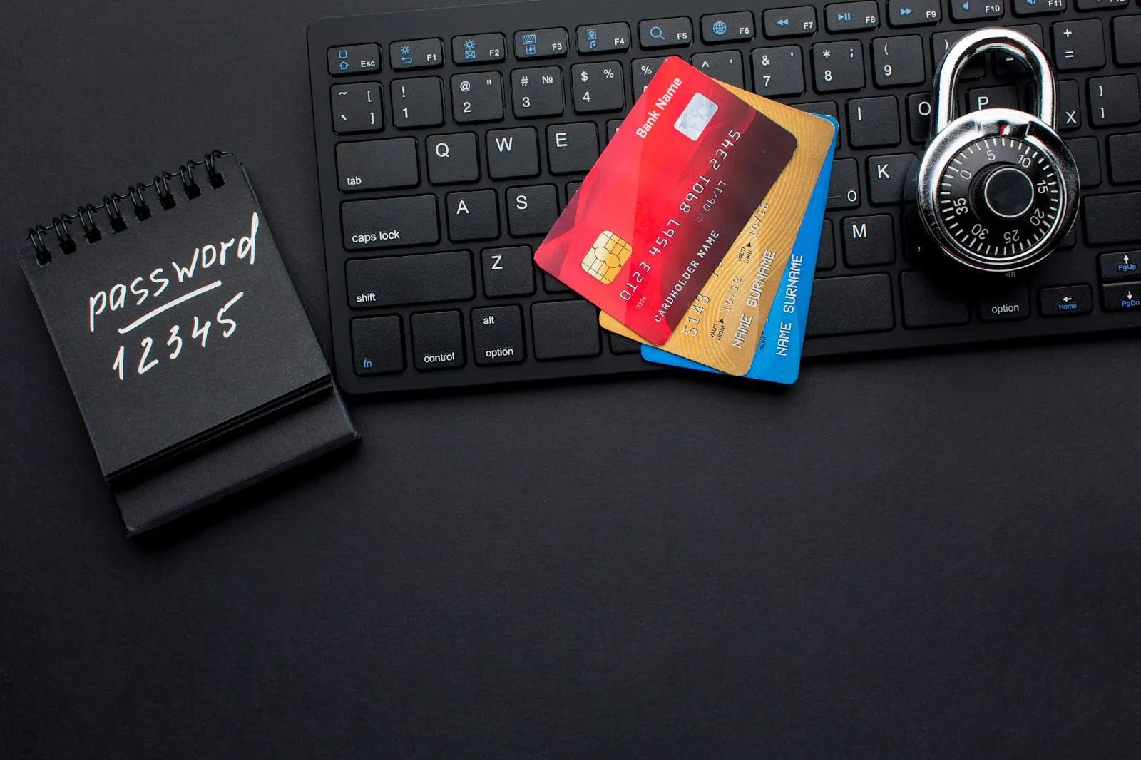 AI in fintech cybersecurity concept with credit cards, padlock, and password notebook highlighting fraud detection and data protection